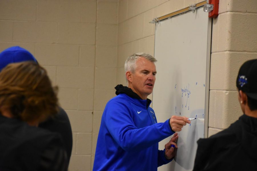 Coach Doherty going over the gameplan in the locker room.