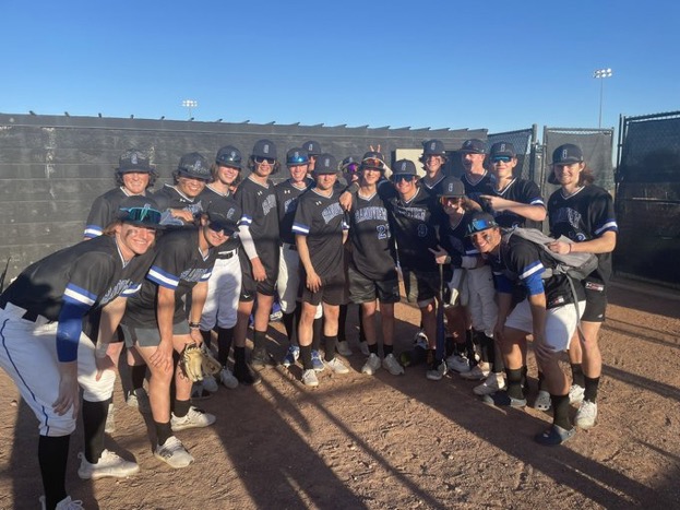 Biaggi (27) celebrating his perfect game with the team after beating Piedra Vista.