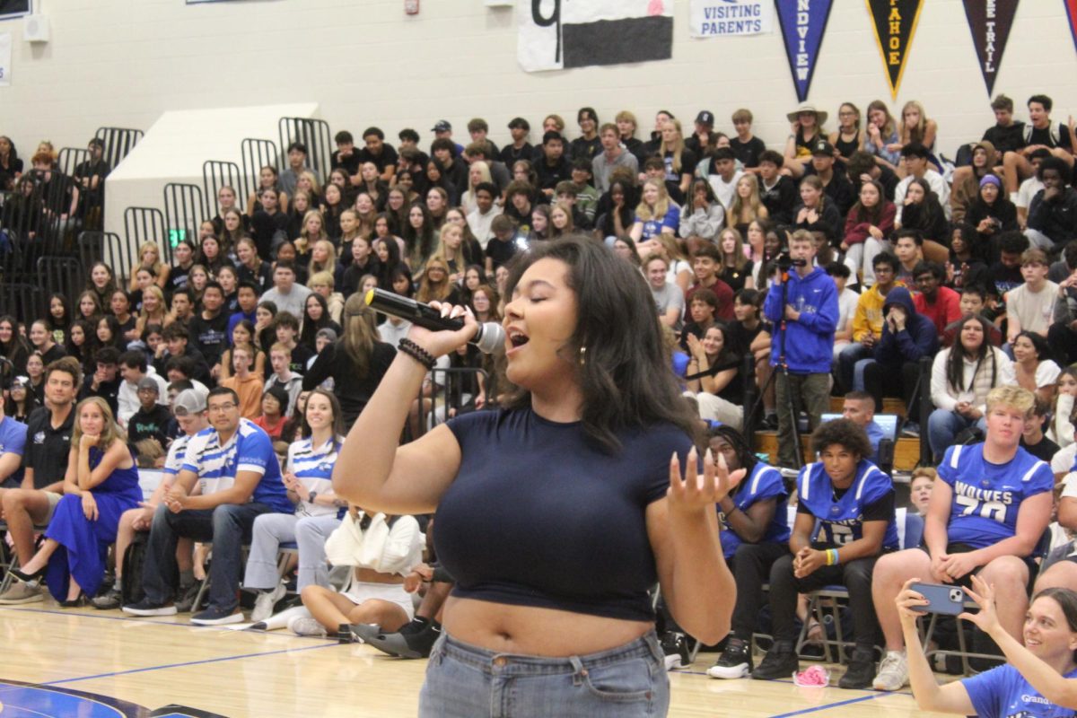 Senior Jordan Ball represents the seniors as she sings for the Sing-Off at the Pep Assembly.