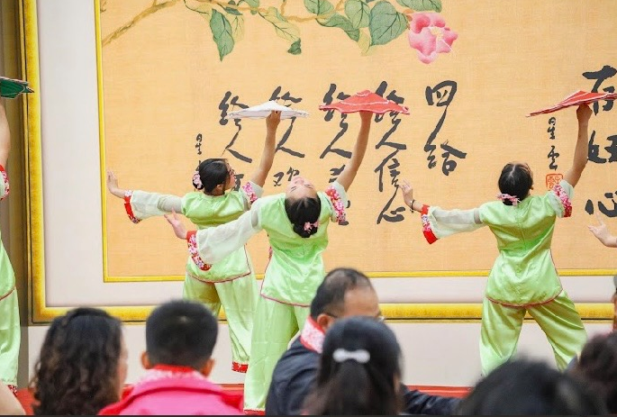 The handkerchief dance described by Kate preformed at God Meets Buddha.