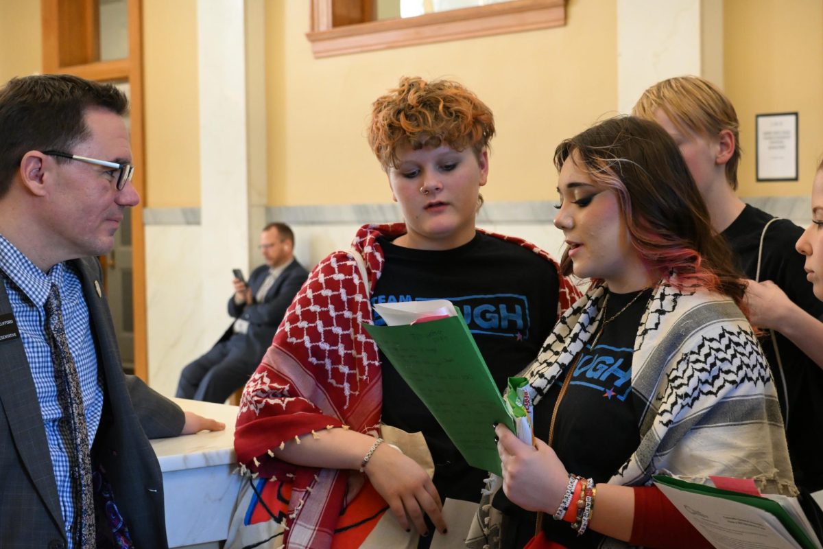 Team Enough Members Bre Kennedy (10) and Sam Parker (10) talk to Colorado Representative.