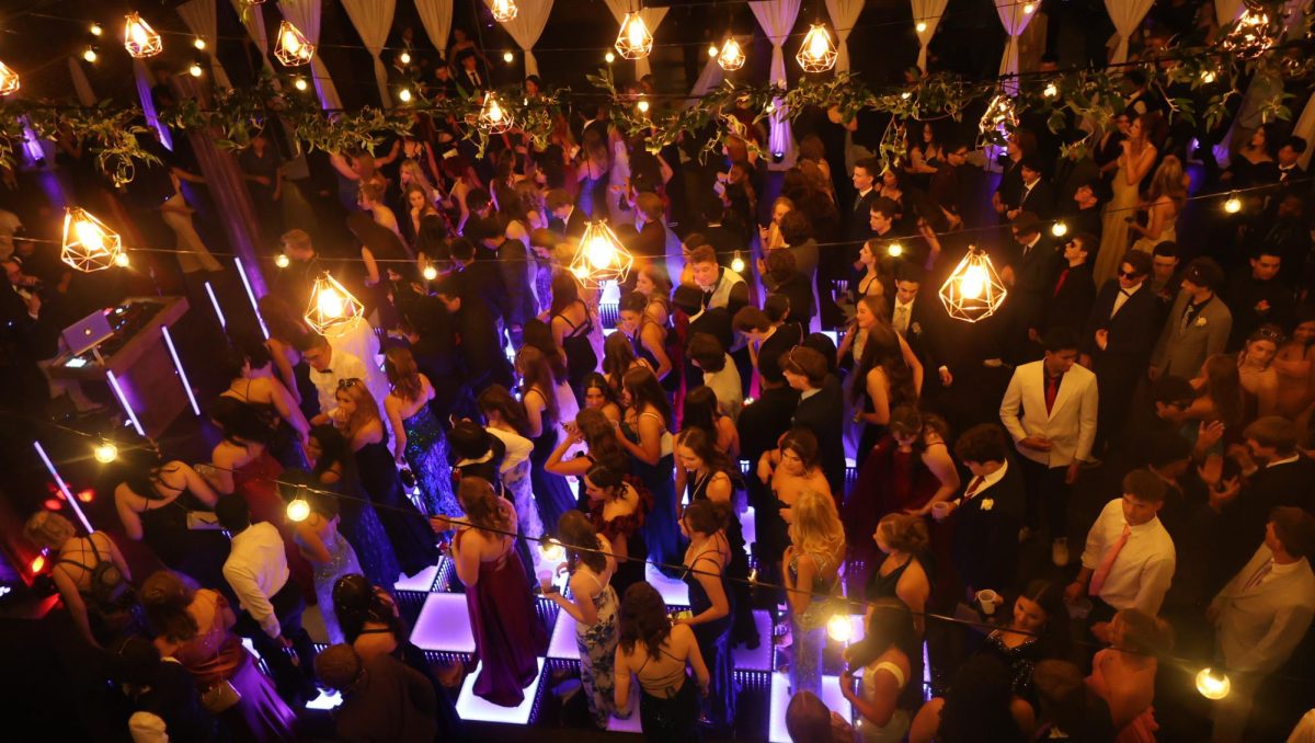 Laughter, music, and movement bring the dance floor to life during the 2026 prom.