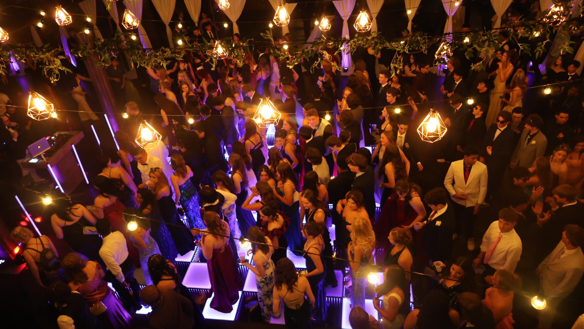 Laughter, music, and movement bring the dance floor to life during the 2026 prom.